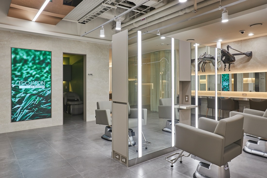 Styling stations with green art wall